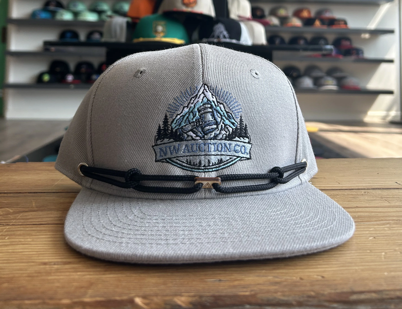 NW Auction Co. Snapback Hat